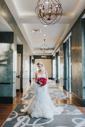 Bride in Hallway with Bouquet
